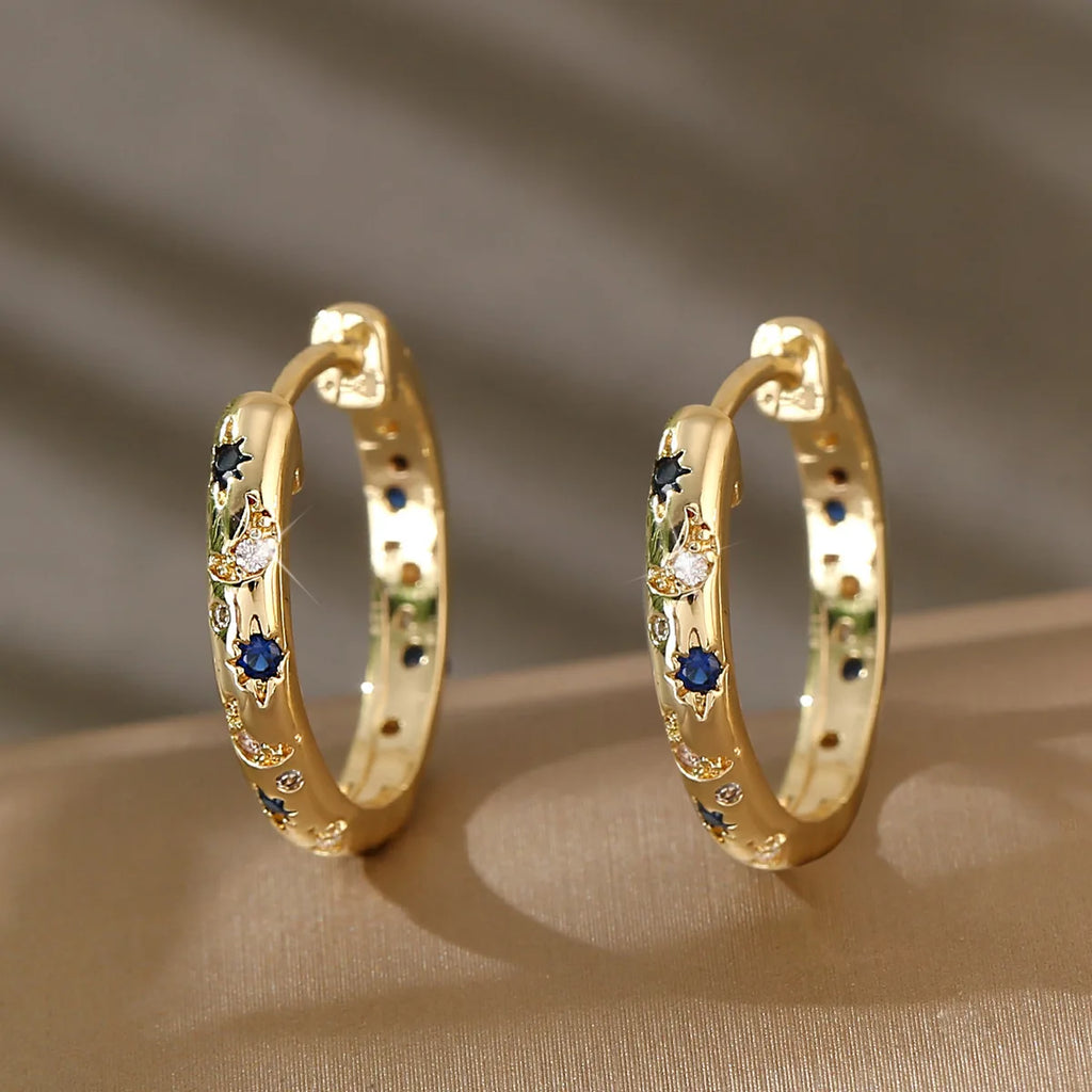 Gold Tone Copper Alloy Hoop Earrings with Blue Zircons