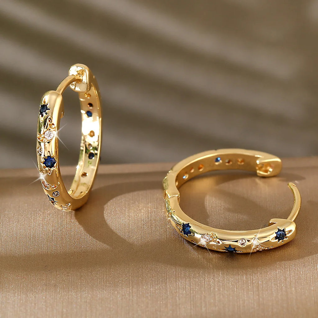 Gold Tone Copper Alloy Hoop Earrings with Blue Zircons