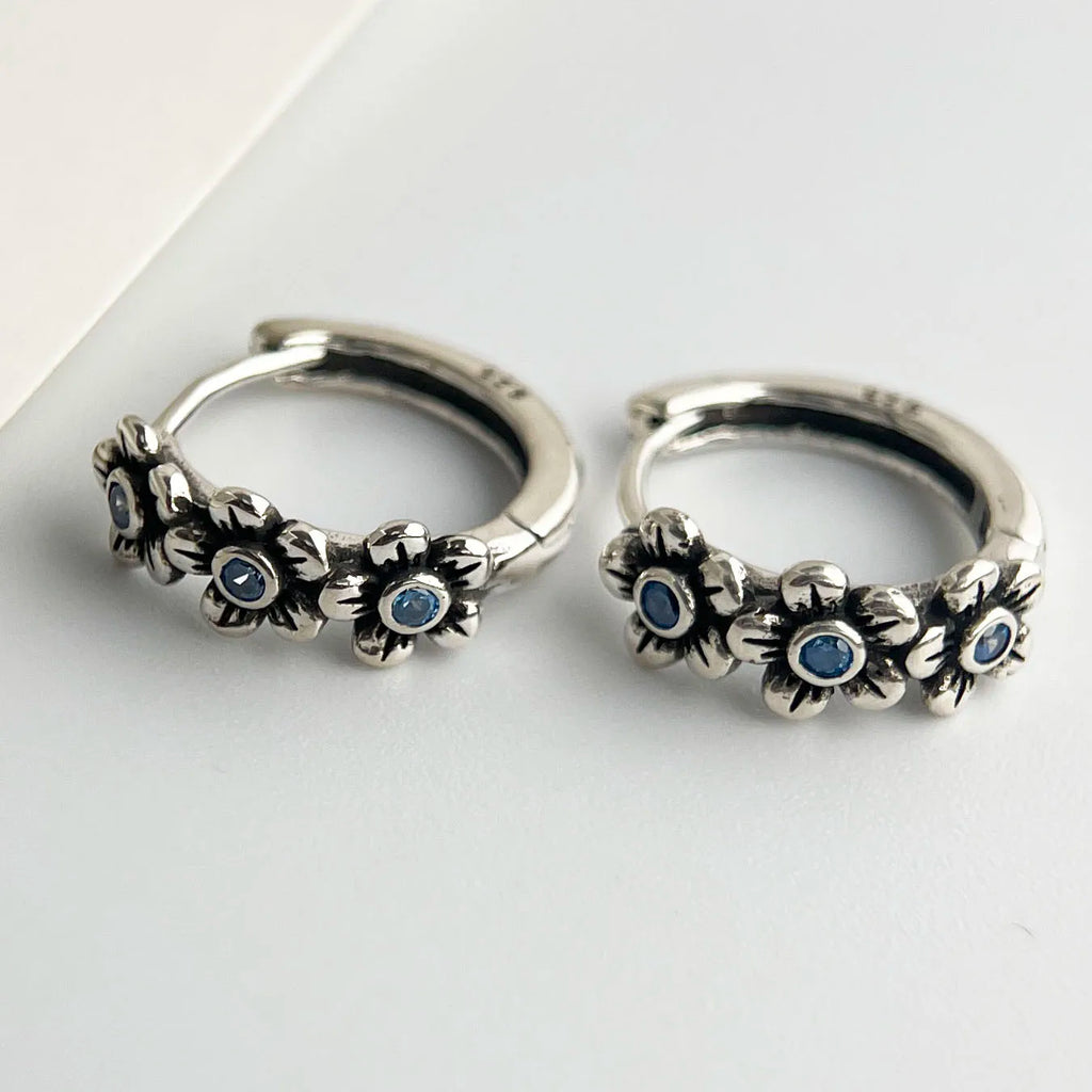 Blackened 925 Sterling Silver Blue CZ Flower Hoop Earrings