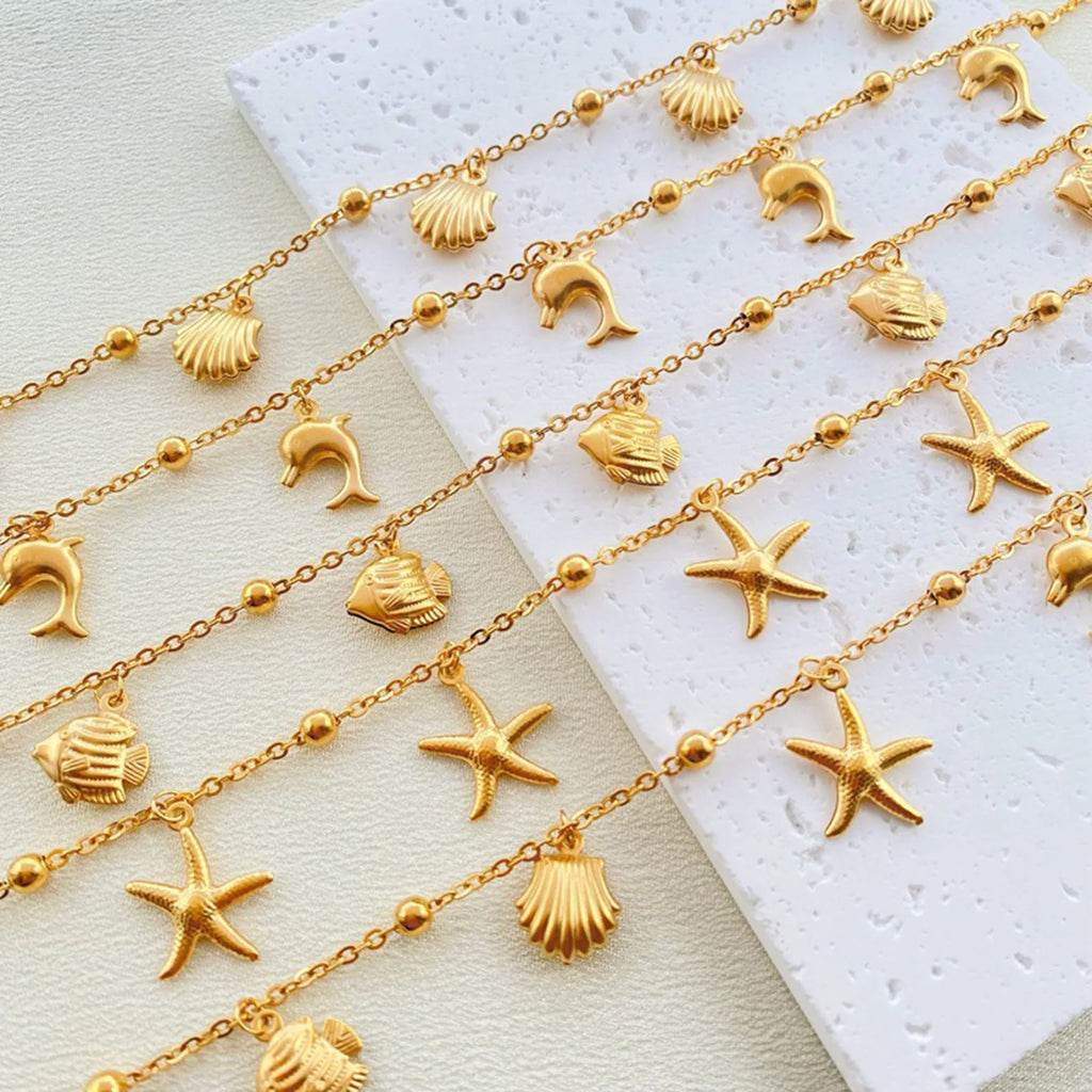 Gold Tone Stainless Steel Summer Ocean Theme Anklet - Dolphins, Starfish, Shell