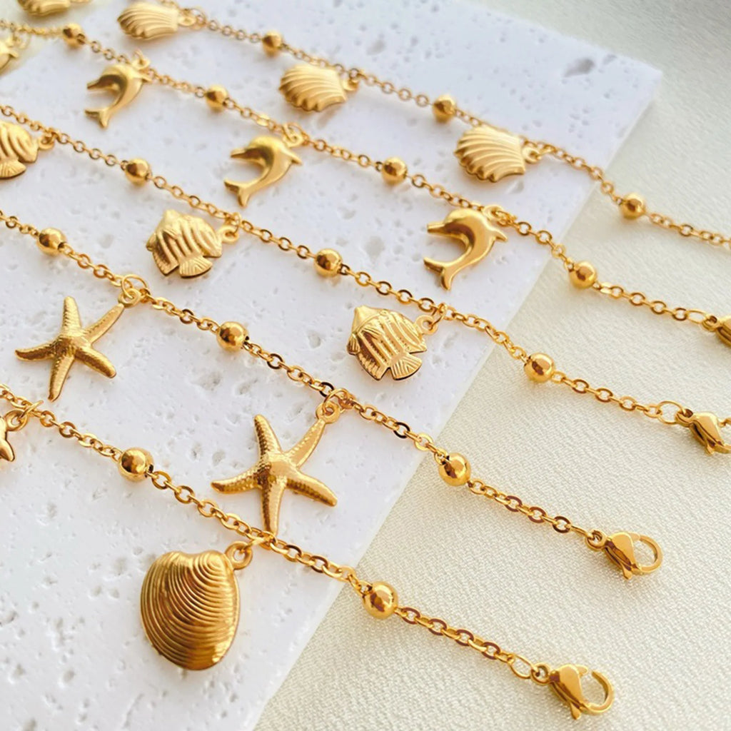 Gold Tone Stainless Steel Summer Ocean Theme Anklet - Dolphins, Starfish, Shell