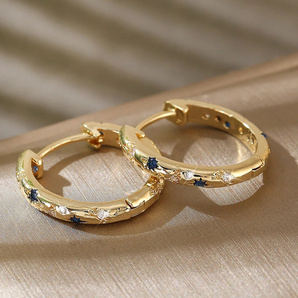 Gold Tone Copper Alloy Hoop Earrings with Blue Zircons