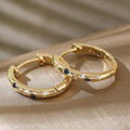 Gold Tone Copper Alloy Hoop Earrings with Blue Zircons