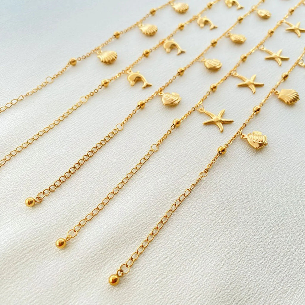 Gold Tone Stainless Steel Summer Ocean Theme Anklet - Dolphins, Starfish, Shell