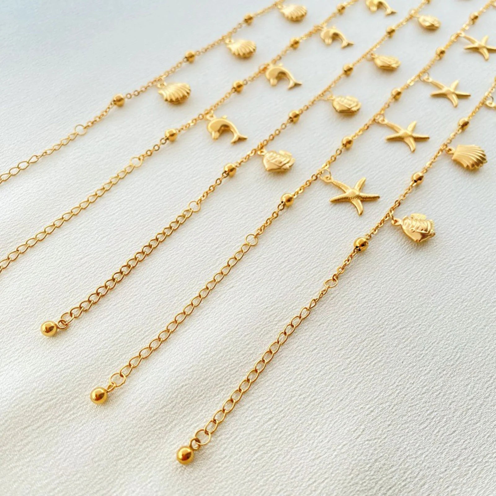 Gold Tone Stainless Steel Summer Ocean Theme Anklet - Dolphins, Starfish, Shell