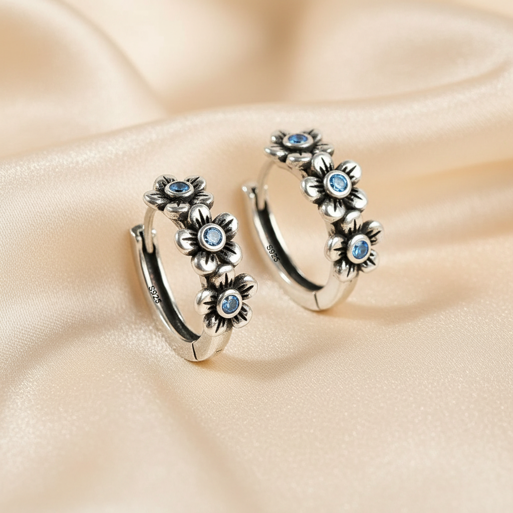 Blackened 925 Sterling Silver Blue CZ Flower Hoop Earrings